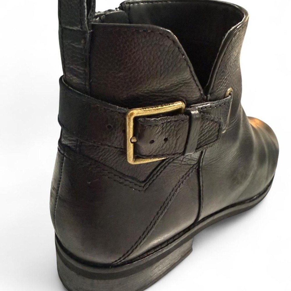 Cole Haan black leather ankle boots with gold buckle